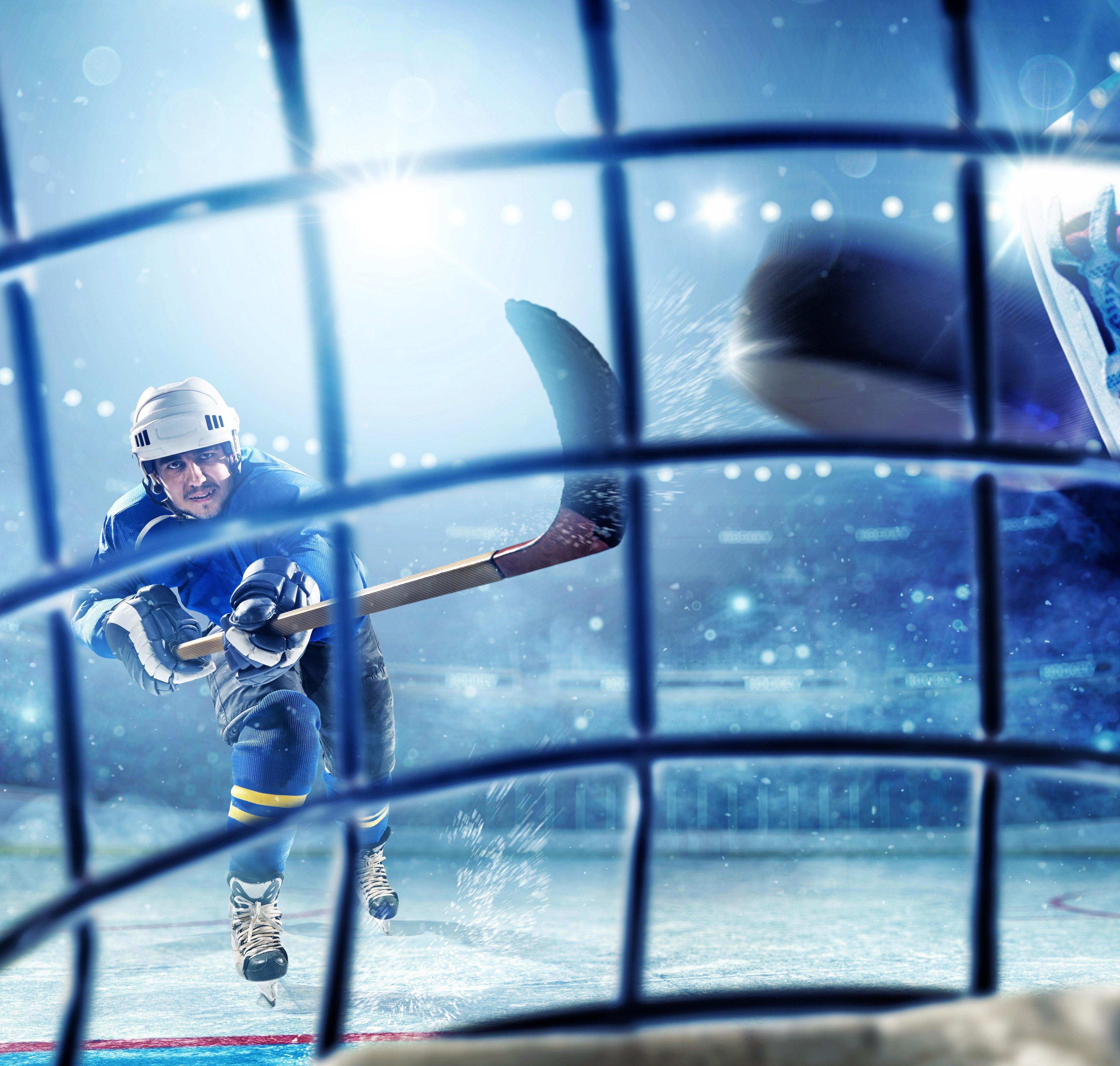 Ice hockey player trying to score